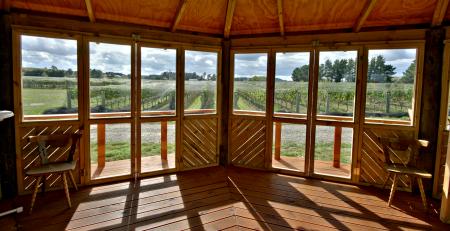 View of the vineyards from inside the tasting room